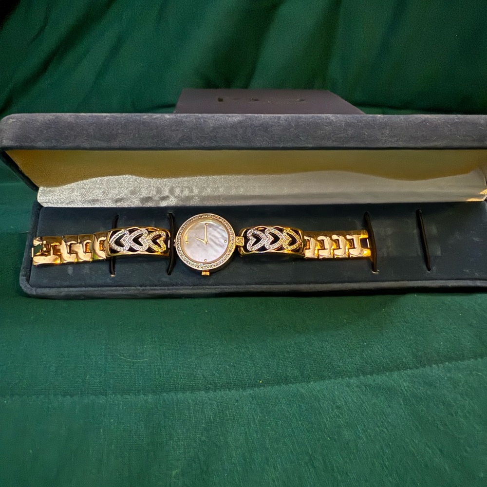 The Bradford Exchange Gold and Silver Watch with Intricate Design